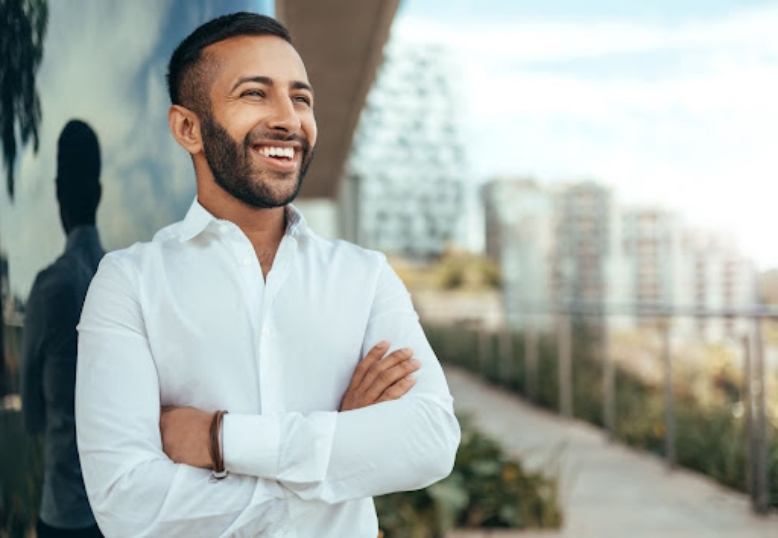 smiling man looking at the sky