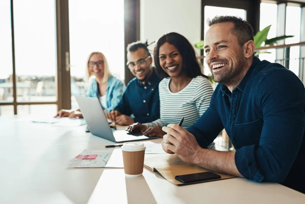 group-discussing-family-benefits-under-a-self-funded-health-plan_Roundstone Insurance