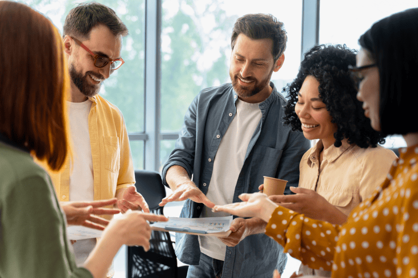 group-discussing-how-self-funded-insurance-works_Roundstone Insurnace