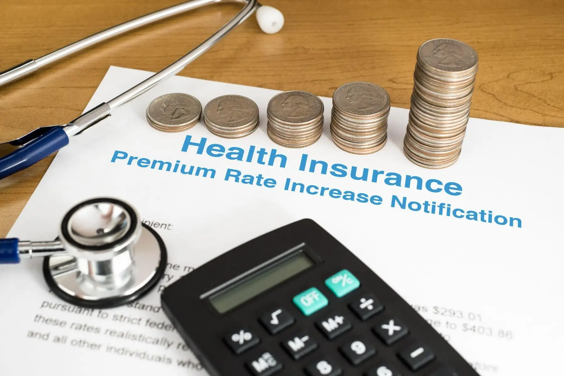 A health insurance premium rate increase notice with a stethoscope, calculator, and rising stacks of coins.