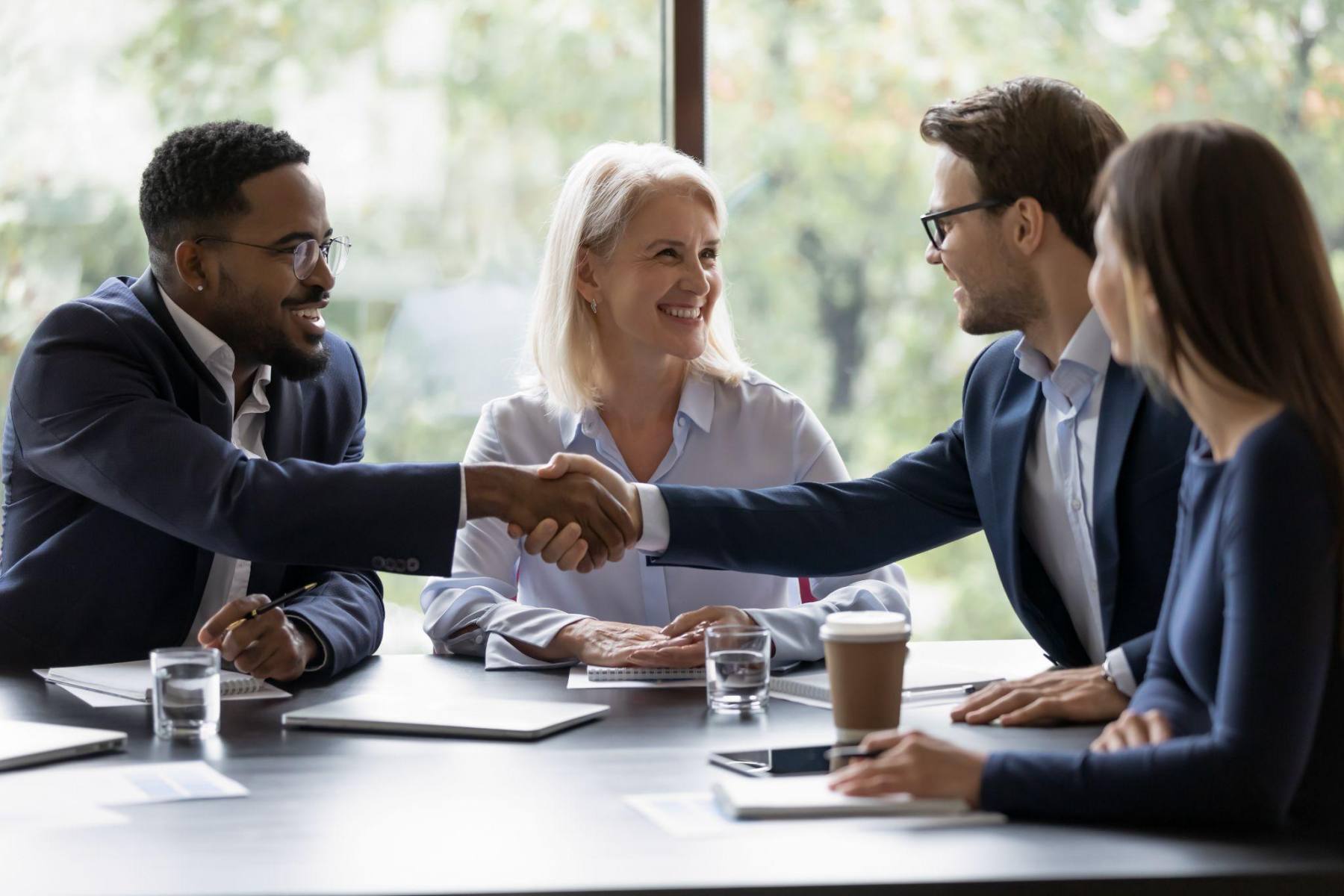 self-funded health plan hand shake