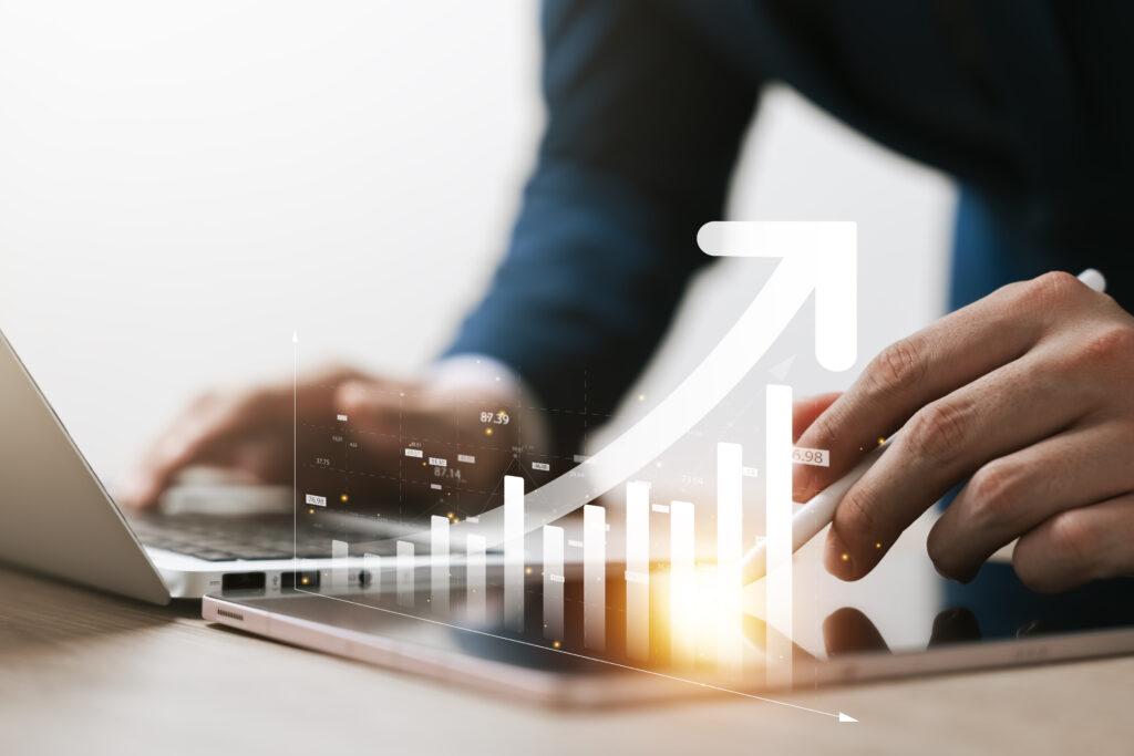 Businessman use laptop and tablet analyzing company growth, futu