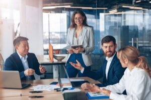 Business team meeting to discuss group captive insurance options